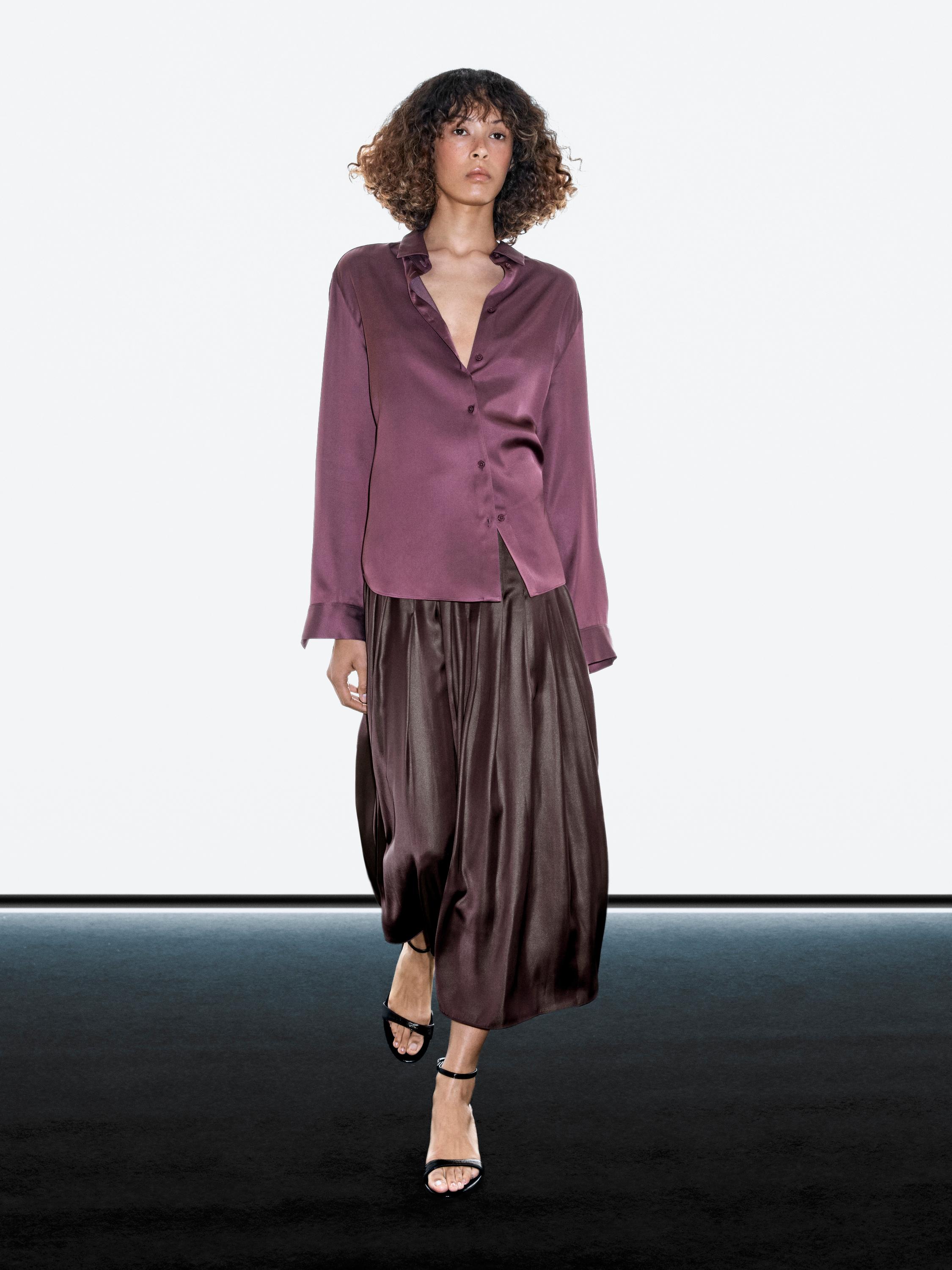 Jupe midi à plis nervurés finition enduite